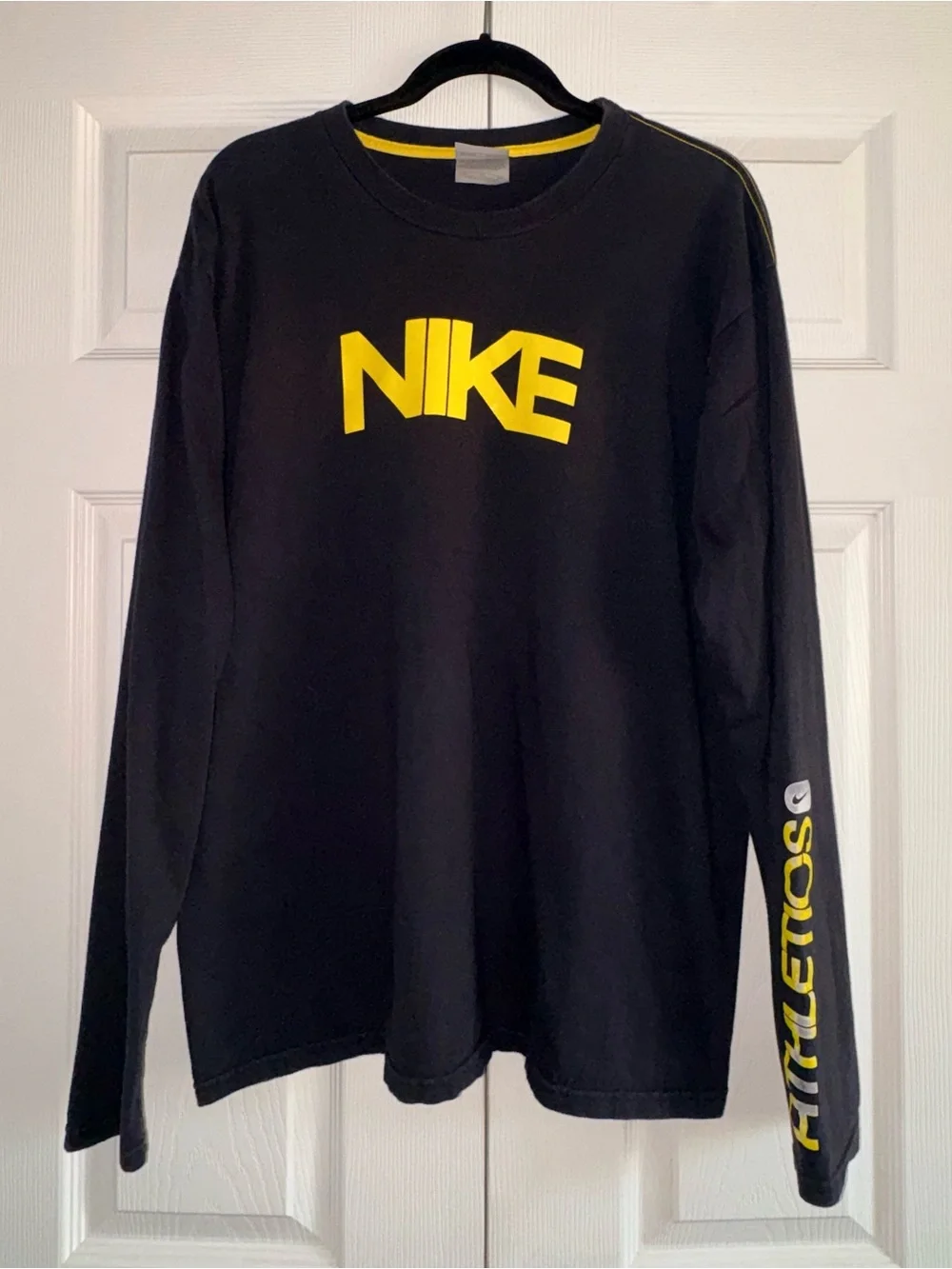 Nike Black Long-Sleeve Tee with Yellow Logo and Sleeve Text